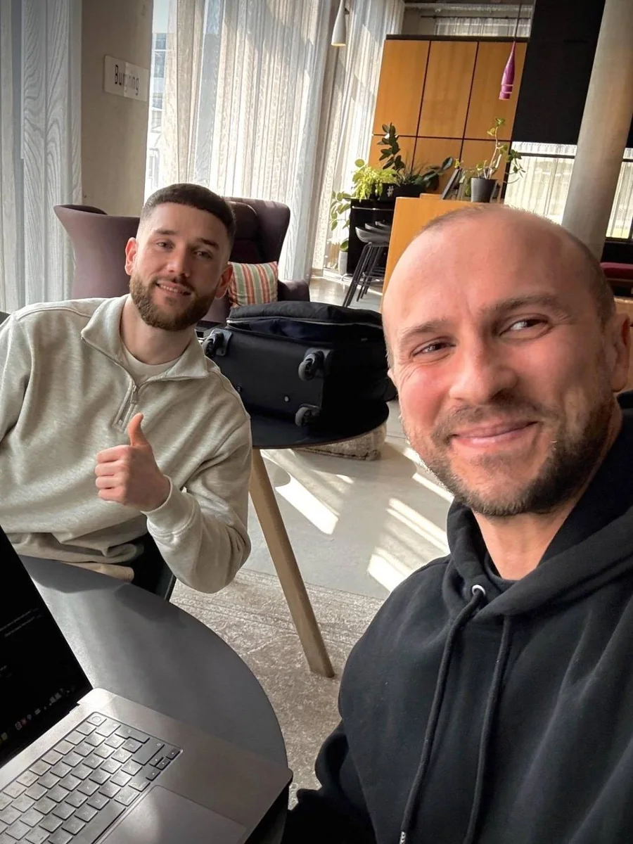 The two AI Video Bootcamp founders working together