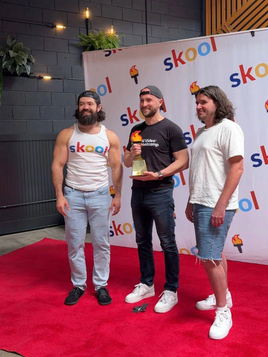 AI Video Bootcamp founders receiving an award at the Skool event